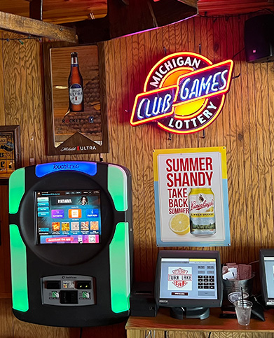 Club Keno screens and bar seating at Turk Lake Bar in Greenville, MI